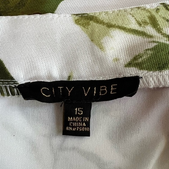 City Vibe Mock Neck Lace-Up Back Lace Top
with Floral Skirt Two-Piece Dress NWT - Picture 6 of 15